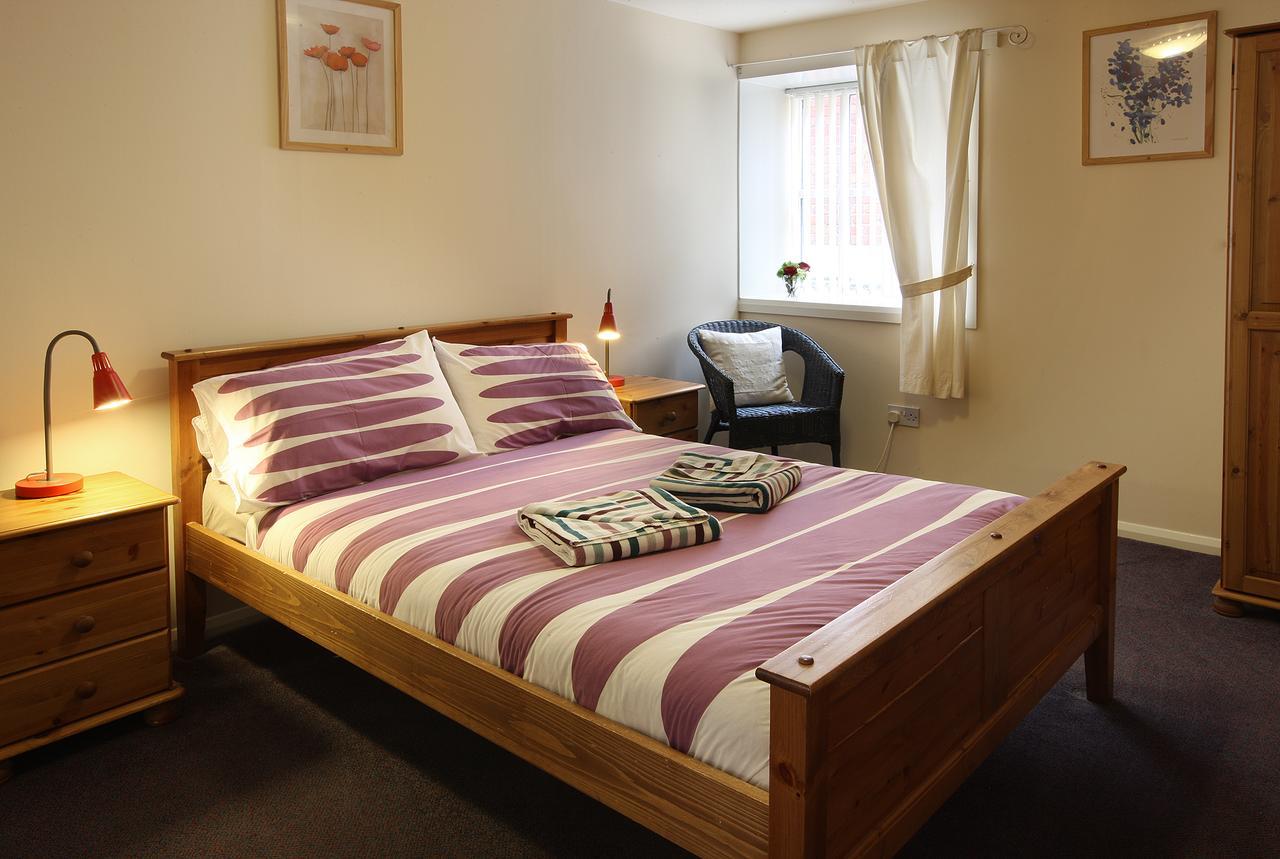 Discovery Accommodation Уитби Экстерьер фото
